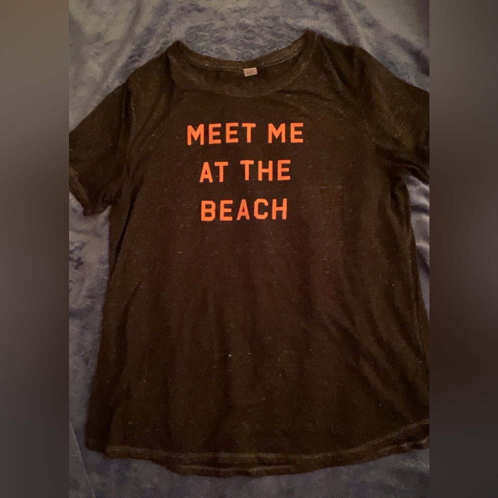 Black t shirt with pink writing